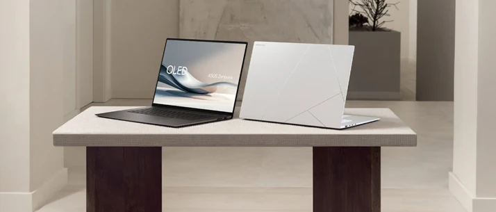 Asus Zenbook S 16 OLED på et bord